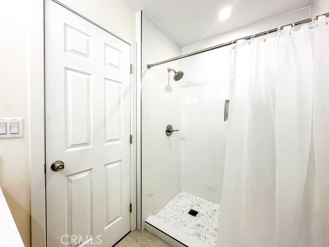 bathroom with walk in shower