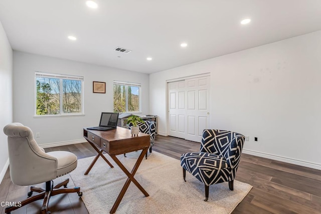 office area featuring dark wood-type flooring