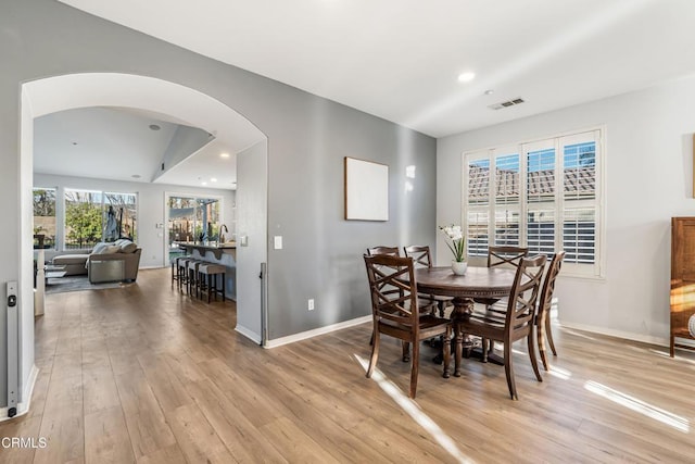 dining space featuring light hardwood / wood-style floors