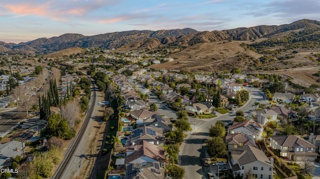 aerial view at dusk with a mountain view