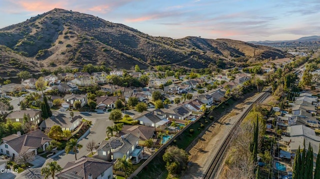 aerial view at dusk with a mountain view