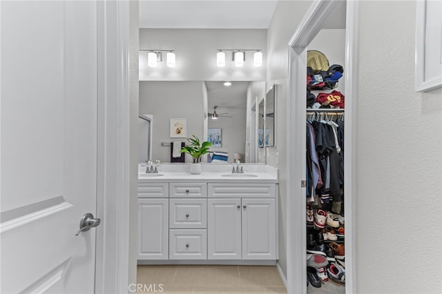 bathroom with vanity, tile patterned flooring, and ceiling fan