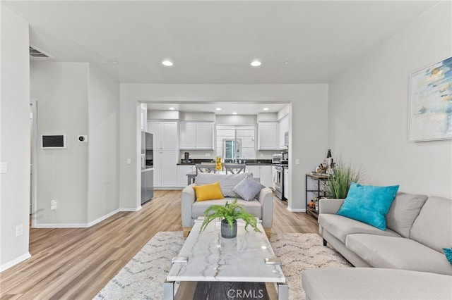 living room featuring light hardwood / wood-style flooring