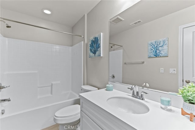 full bathroom with bathtub / shower combination, vanity, and toilet