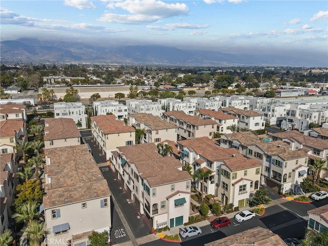 birds eye view of property featuring a mountain view