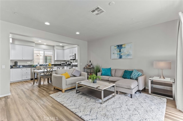 living room featuring light hardwood / wood-style floors