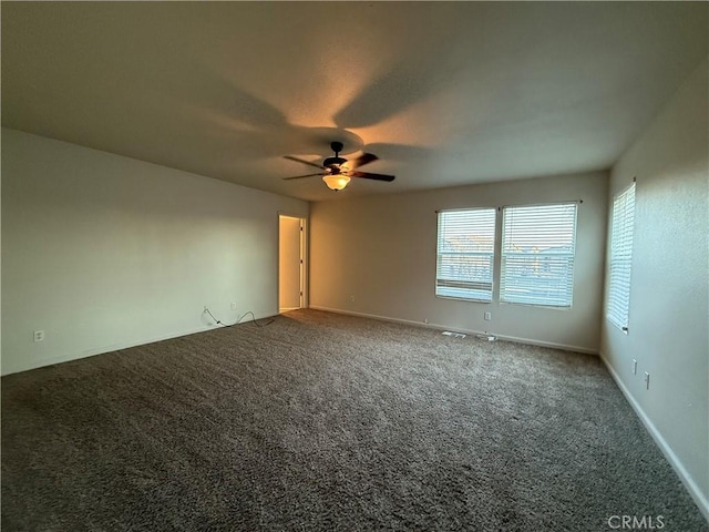 carpeted empty room with ceiling fan