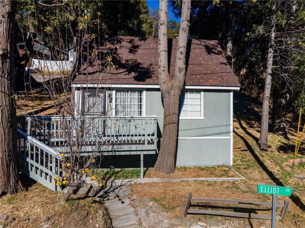 view of front of house with a deck