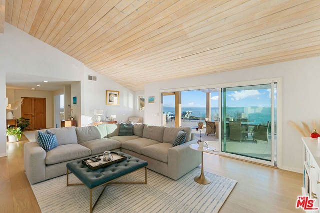 living room featuring high vaulted ceiling, a water view, wooden ceiling, and light wood-type flooring