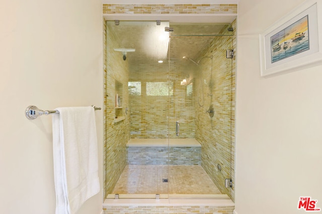 bathroom featuring walk in shower