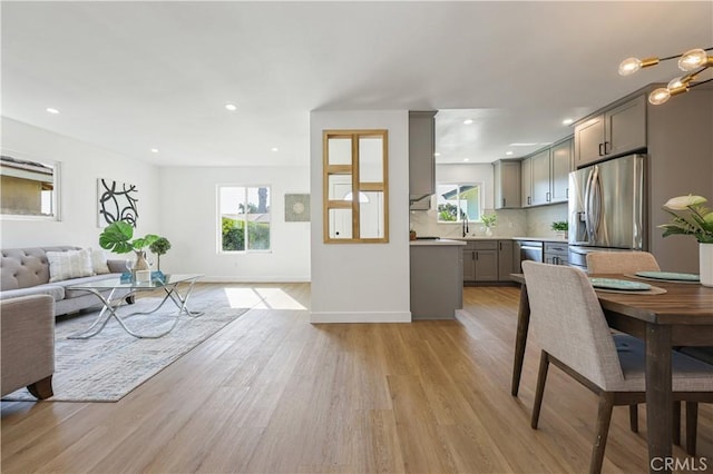 living room with light hardwood / wood-style flooring