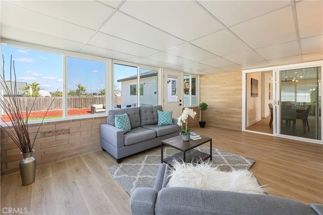 sunroom / solarium with a drop ceiling