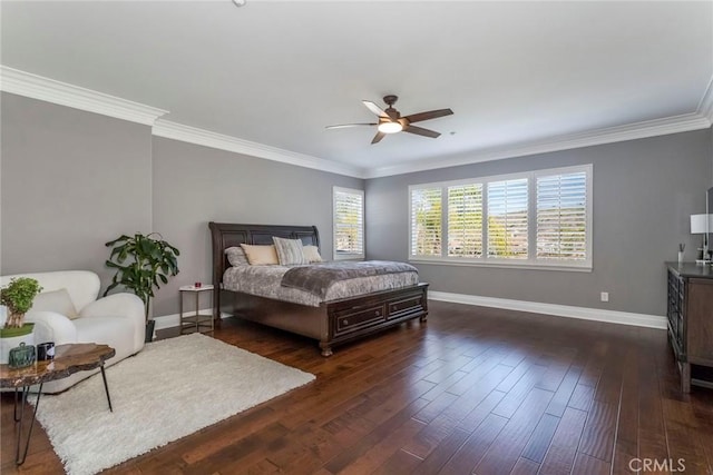 bedroom with crown molding, dark hardwood / wood-style floors, and ceiling fan