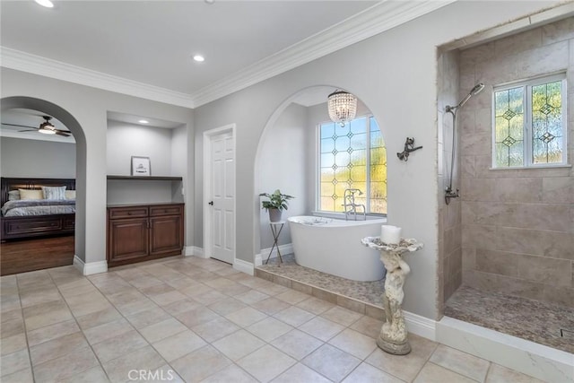 bathroom featuring ceiling fan with notable chandelier, ornamental molding, shower with separate bathtub, and tile patterned floors