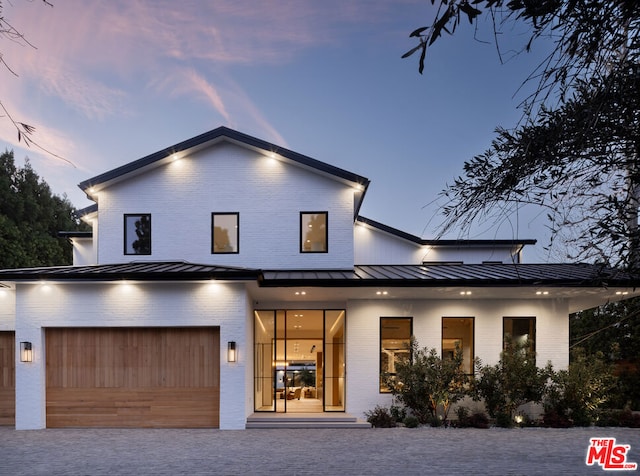 view of front of property featuring a garage