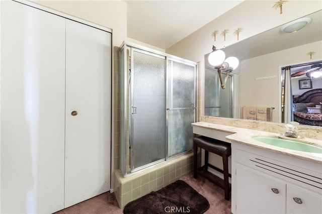 bathroom with vanity and an enclosed shower