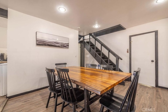 dining room with light wood-type flooring