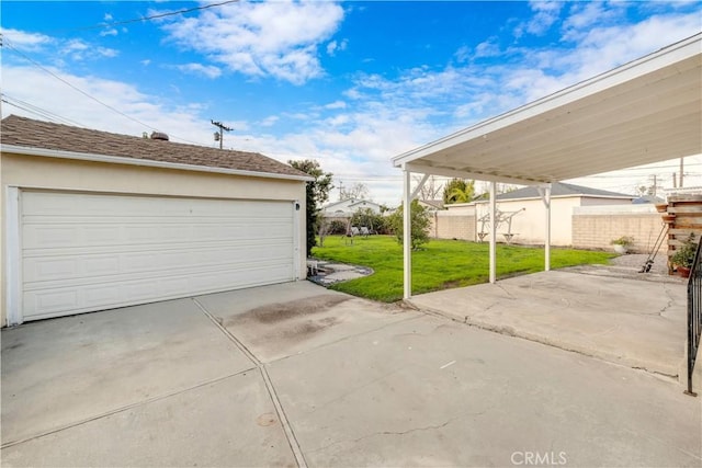 garage with a lawn