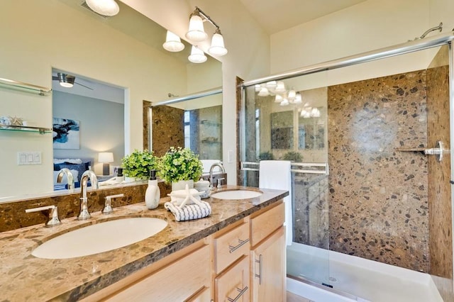 bathroom featuring vanity, a notable chandelier, and walk in shower