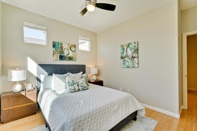 bedroom featuring ceiling fan and light wood-type flooring