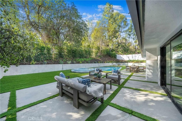 view of patio with a fenced in pool and an outdoor hangout area