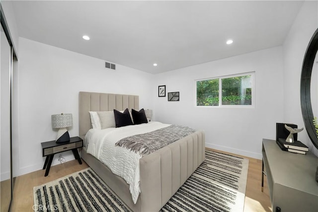 bedroom featuring light wood-type flooring