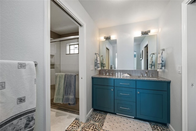 bathroom featuring vanity and walk in shower