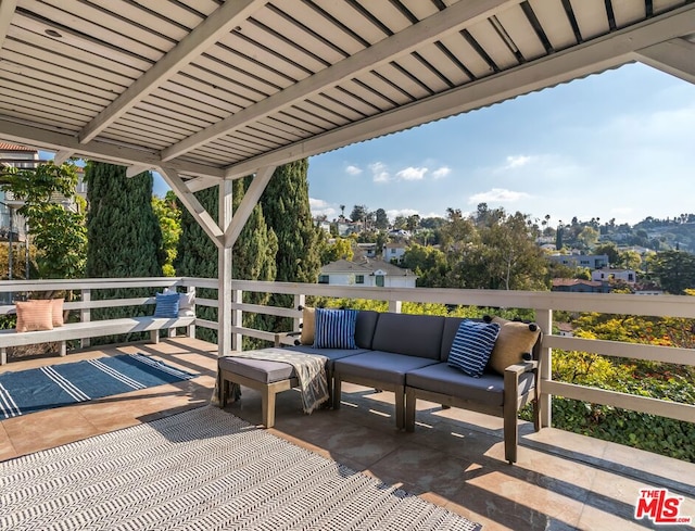 exterior space featuring an outdoor hangout area