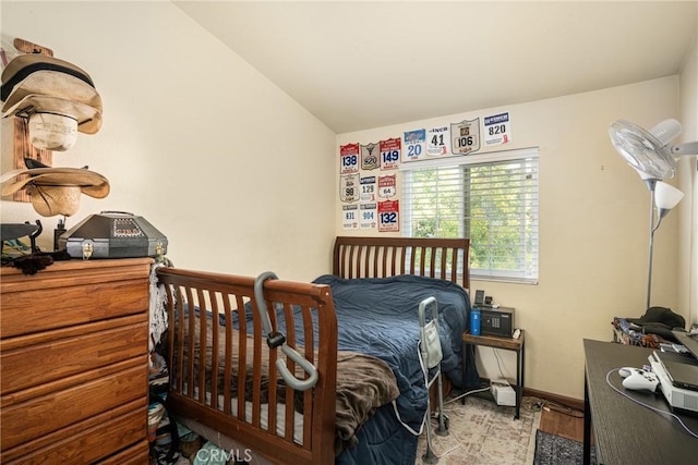 bedroom featuring hardwood / wood-style flooring