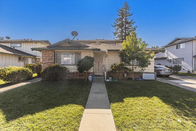 view of front of house with a front lawn