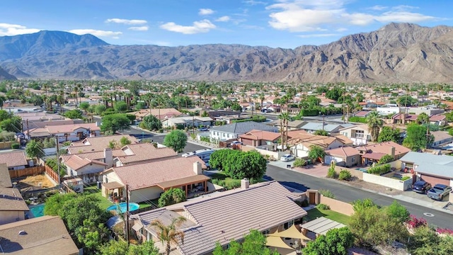 bird's eye view with a mountain view