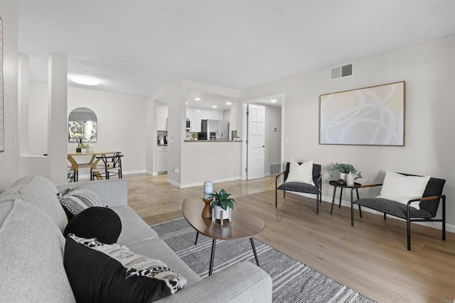 living room featuring light hardwood / wood-style floors