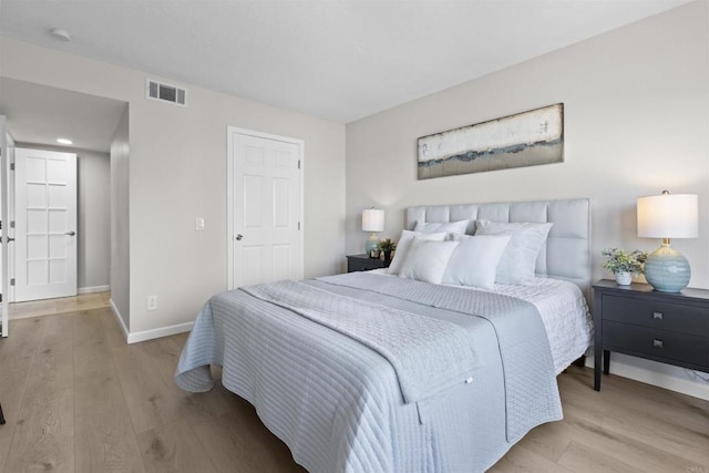 bedroom featuring light hardwood / wood-style flooring