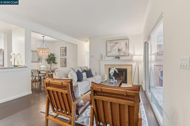 living room with crown molding and dark hardwood / wood-style floors