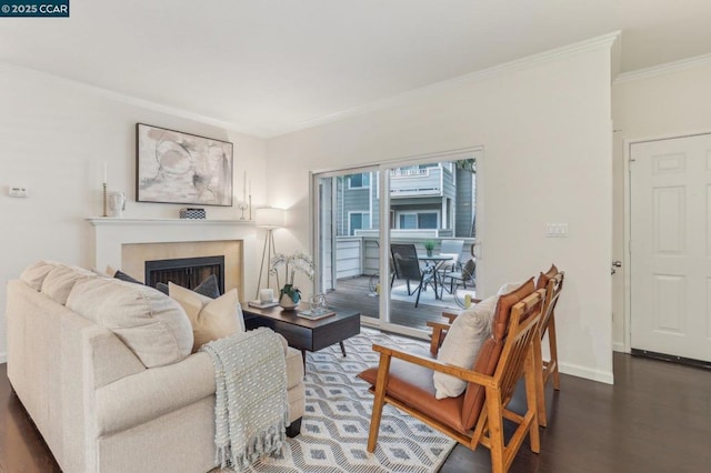 living room featuring crown molding and dark hardwood / wood-style floors