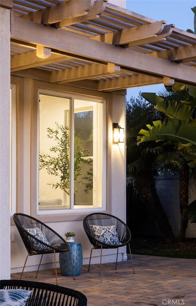 wooden deck featuring a pergola