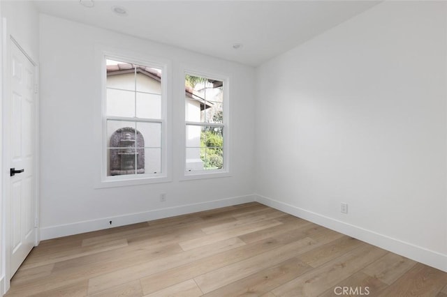 empty room featuring light hardwood / wood-style floors