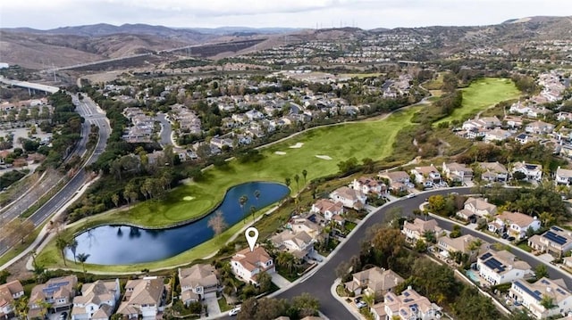 aerial view with a water and mountain view