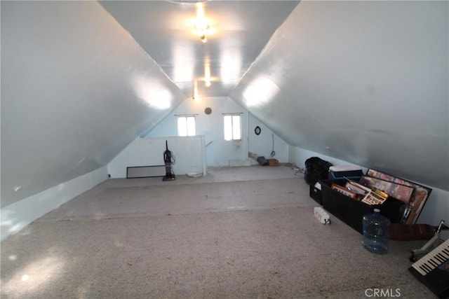 bonus room with vaulted ceiling