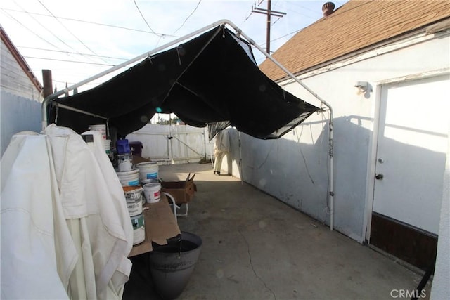 exterior space featuring a gate and fence