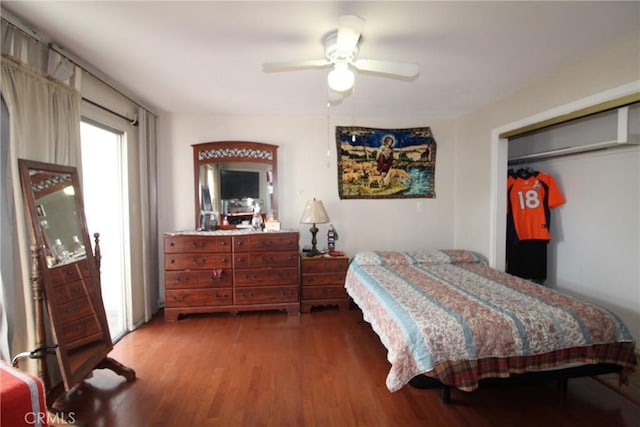 bedroom featuring ceiling fan and wood finished floors