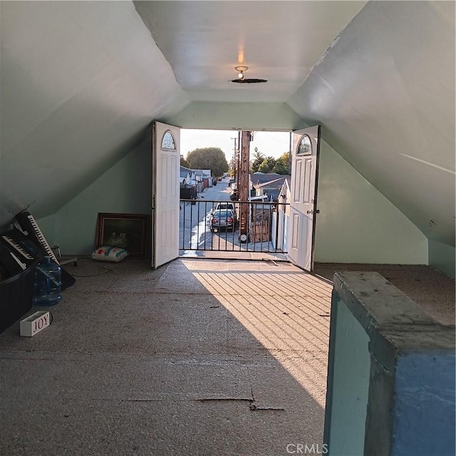 additional living space with lofted ceiling