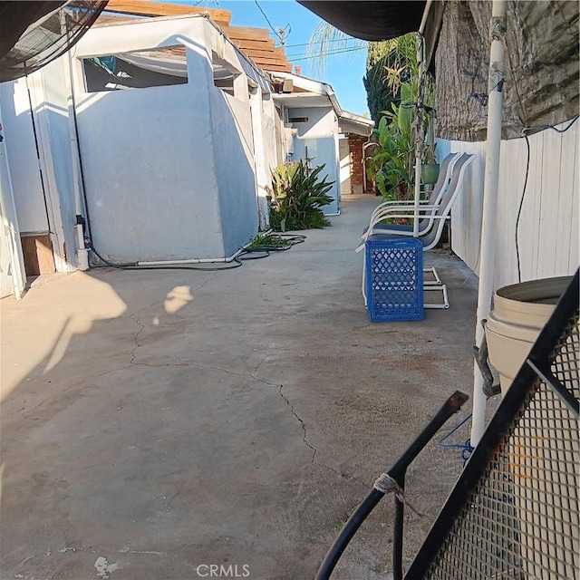 view of patio / terrace with fence