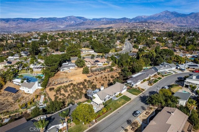13056 Burns Ln, Redlands, CA 92373 - aerial view of property and surrounding area with mountains and nearby suburban area