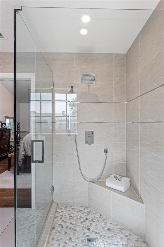 bathroom featuring walk in shower