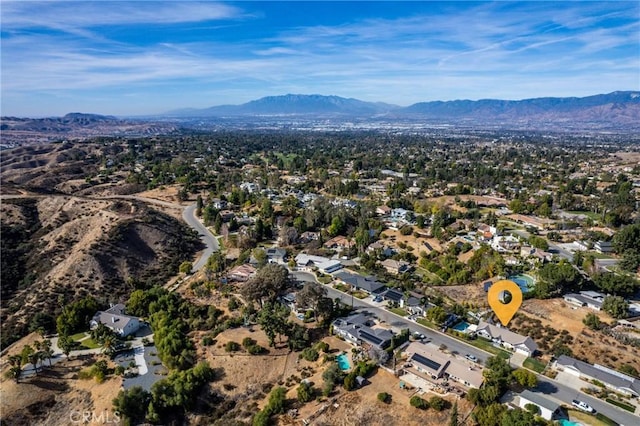 bird's eye view with a mountain view