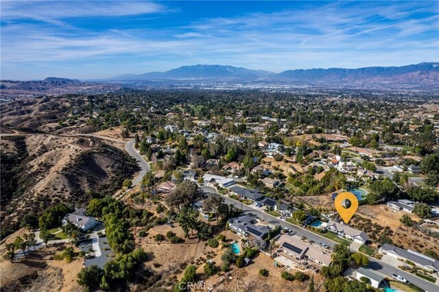 13056 Burns Ln, Redlands, CA 92373 - aerial view of property and surrounding area with a mountain backdrop and nearby suburban area