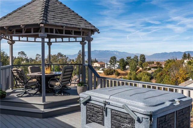 13056 Burns Ln, Redlands, CA 92373 - wooden terrace with a mountain view, a gazebo, and outdoor dining area