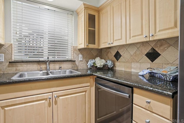 kitchen featuring stainless steel dishwasher, sink, decorative backsplash, and light brown cabinets