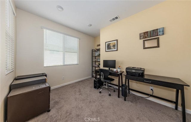 home office with light carpet